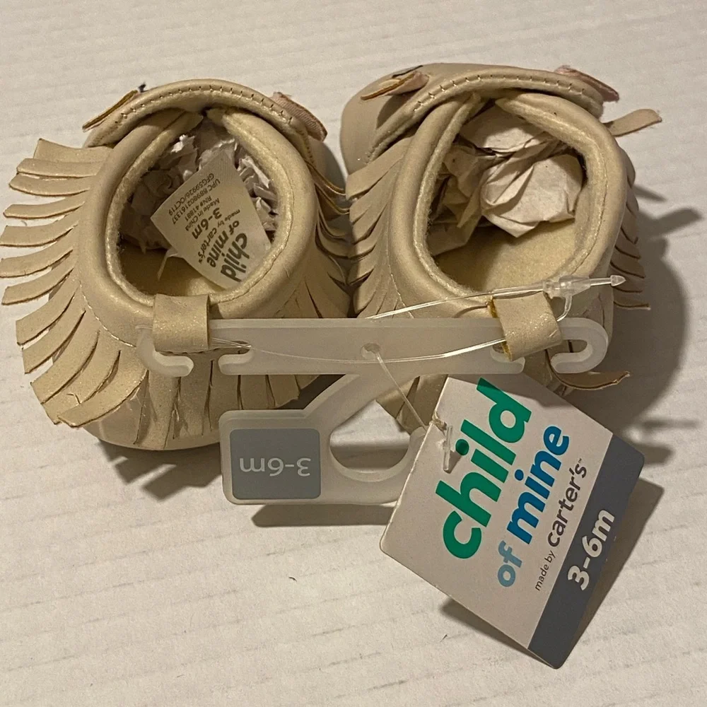 Carter’s Child of Mine 3-6 months beige shimmer fringe moccasin shoes